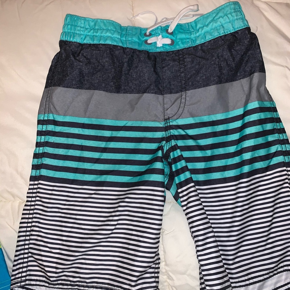 ON board trunks, EUC, boys size 8. No fading.